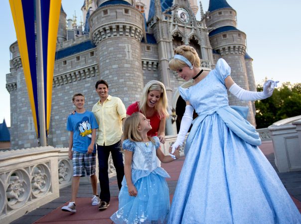 Cinderella and family at Cinderella Castle at Magic Kingdom Park © Disney